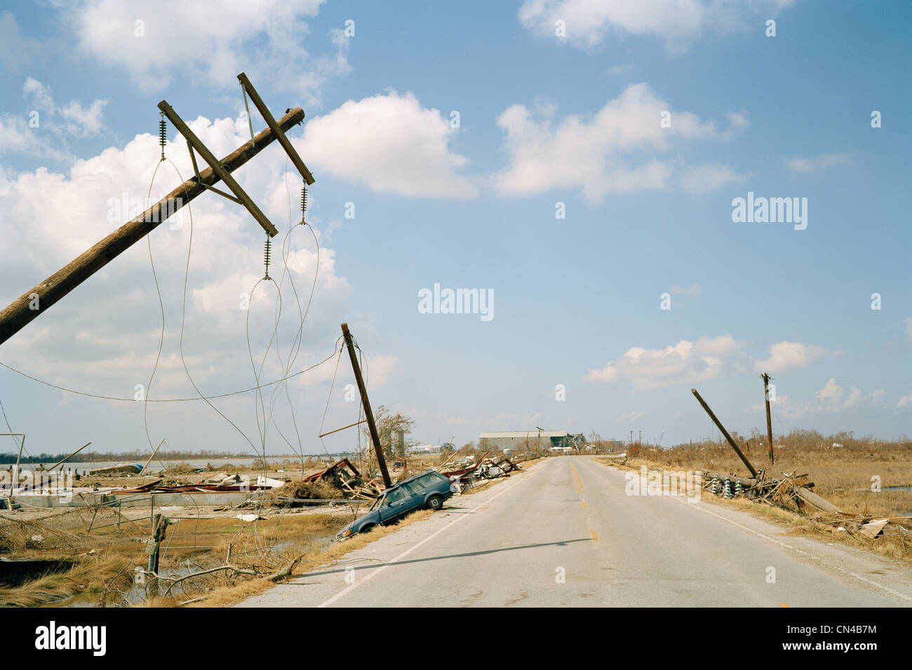 Fallen telephone poles and crashed car, aftermath of Hurricane Katrina, Cameron, Louisiana. USA Stock Photo