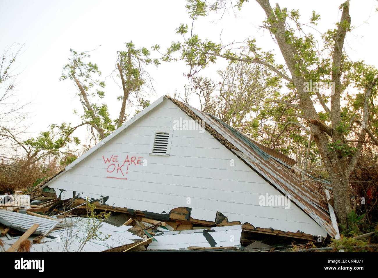 Upper level of residential house on ground amidst wreckage, aftermath of Hurraine Katrina, Biloxi, USA Stock Photo