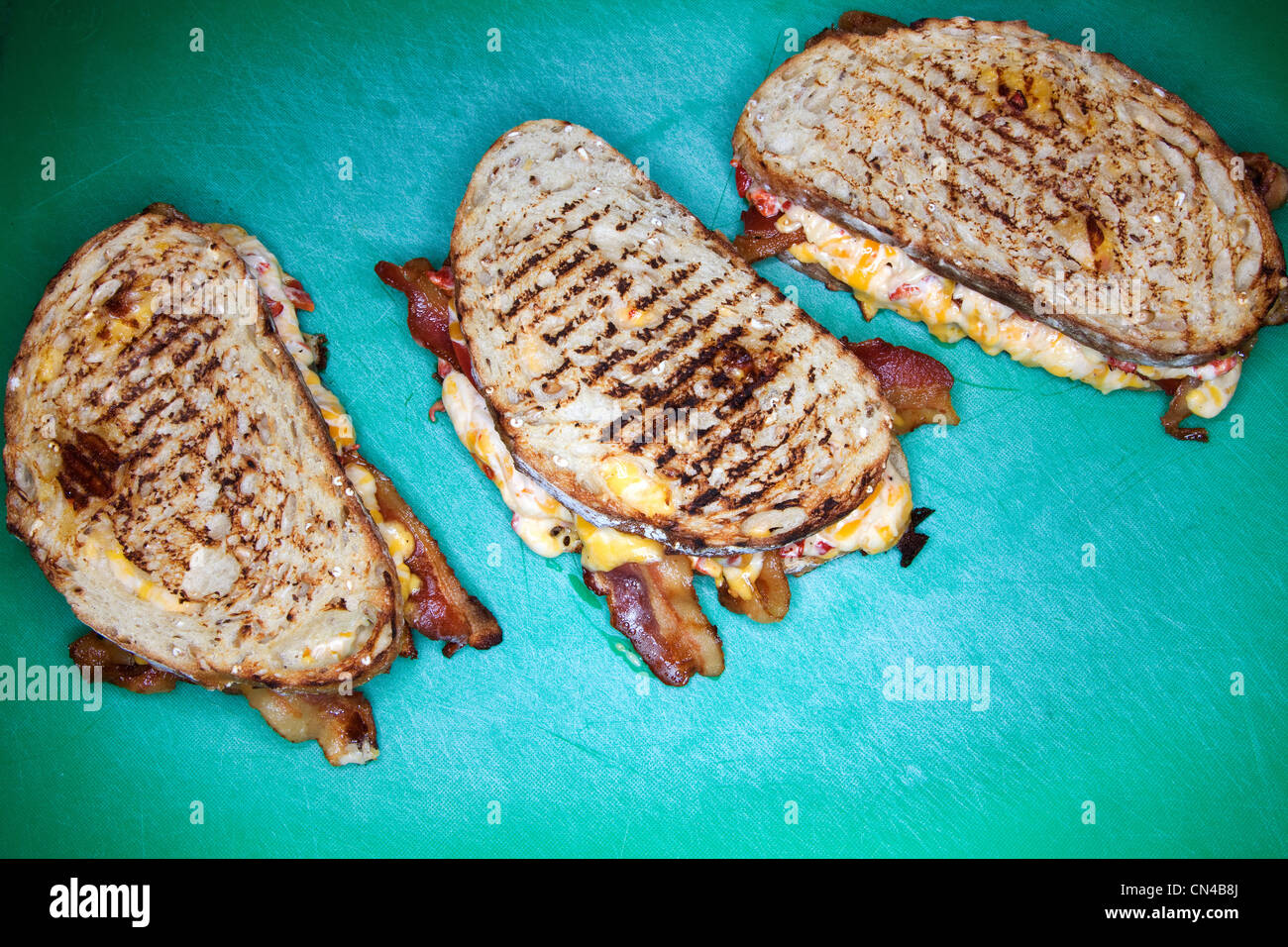 Three grilled cheese sandwiches Stock Photo