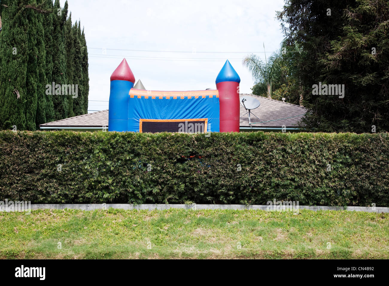 Inflatable bouncy castle on suburban street Stock Photo