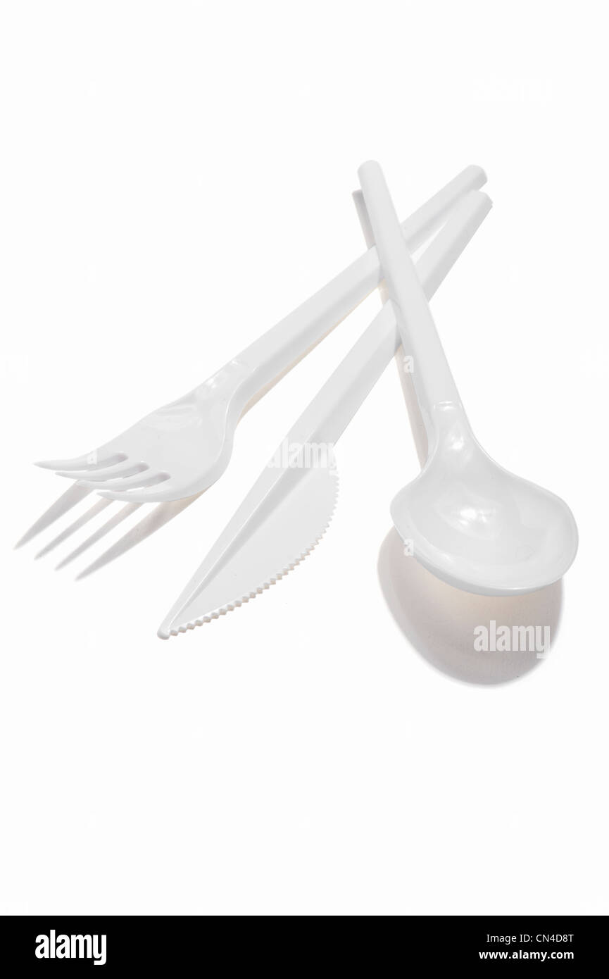 A plastic knife, fork and spoon Stock Photo