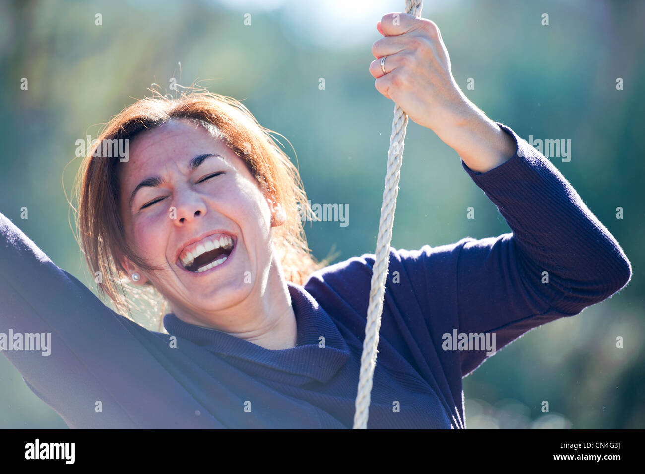 woman having fun with rope Stock Photo
