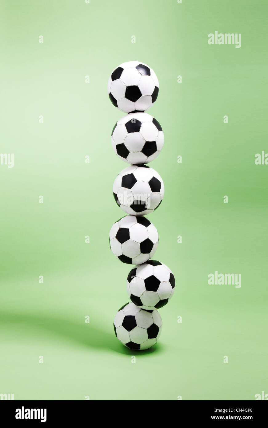 Six footballs stacked on top of each other Stock Photo Alamy