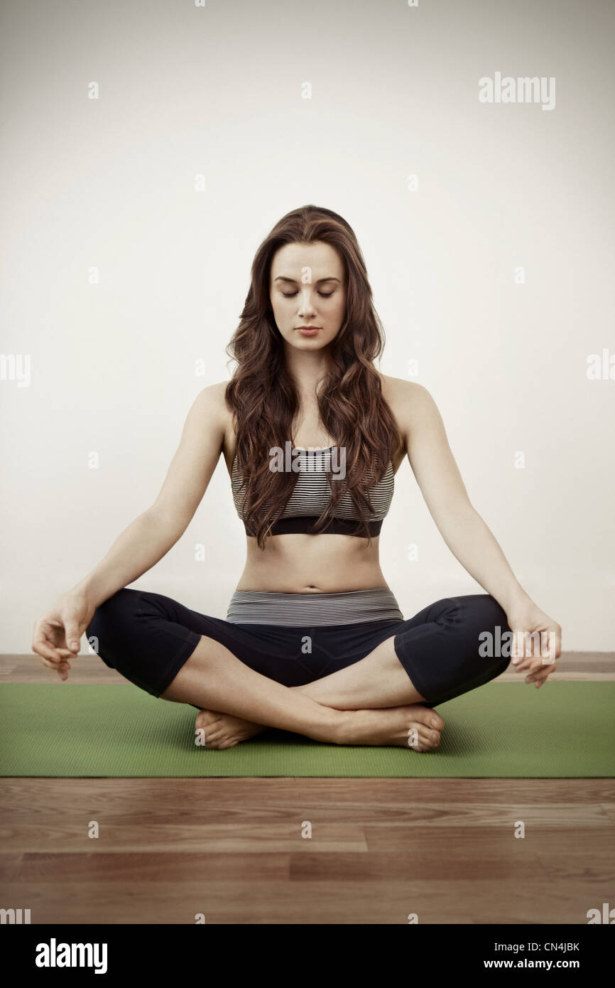 Woman meditating Stock Photo