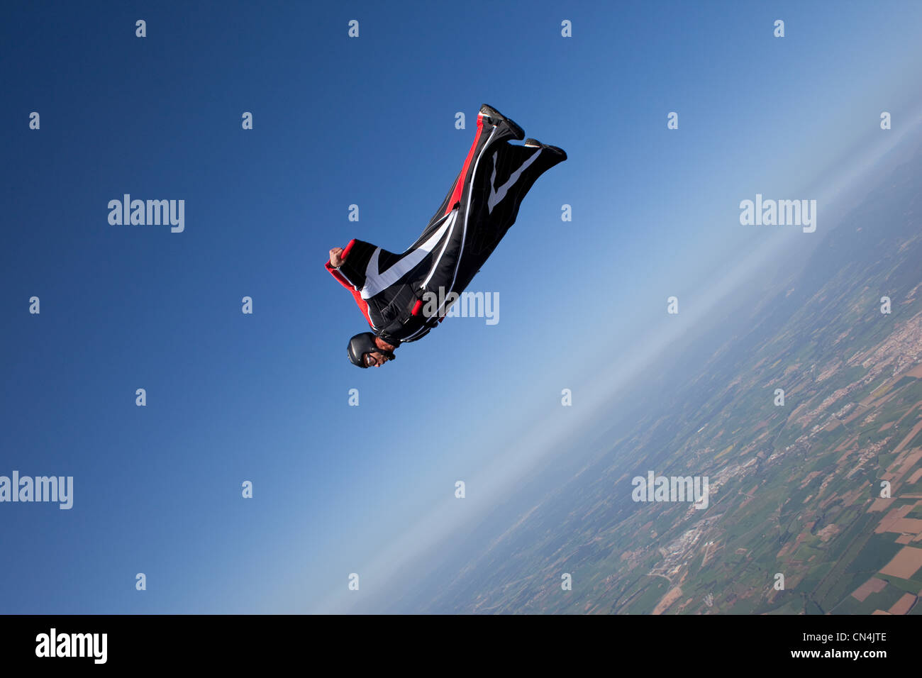 Man wingsuit flying Stock Photo
