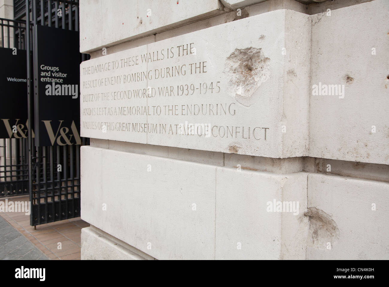 Bomb damaged wall outside the Victoria and Albert museum in London Britain Stock Photo