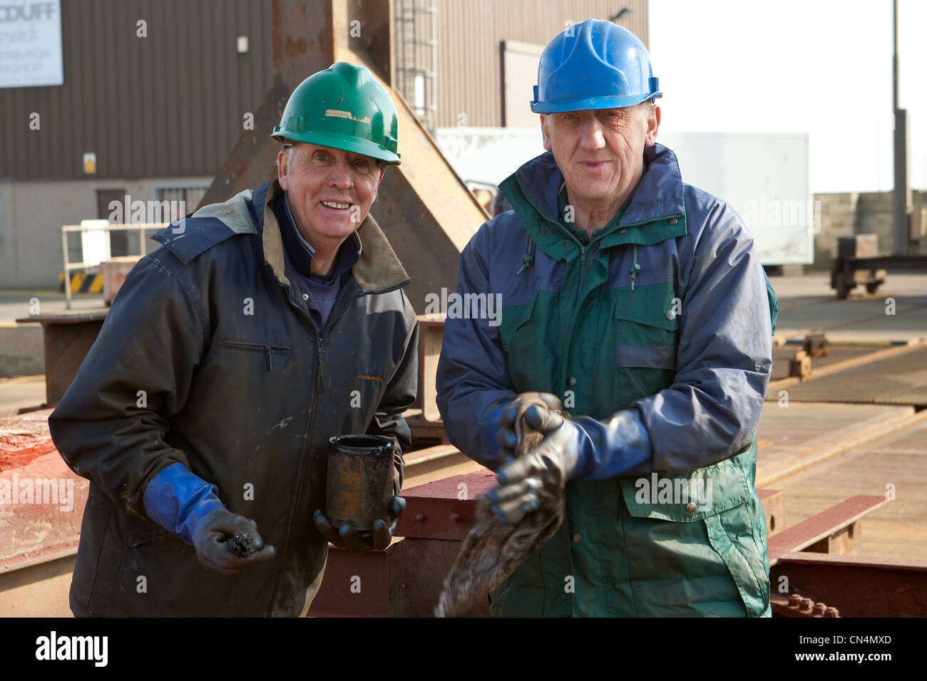 Engineers working Fraserburgh ship repair yards. Scotland UK Stock Photo