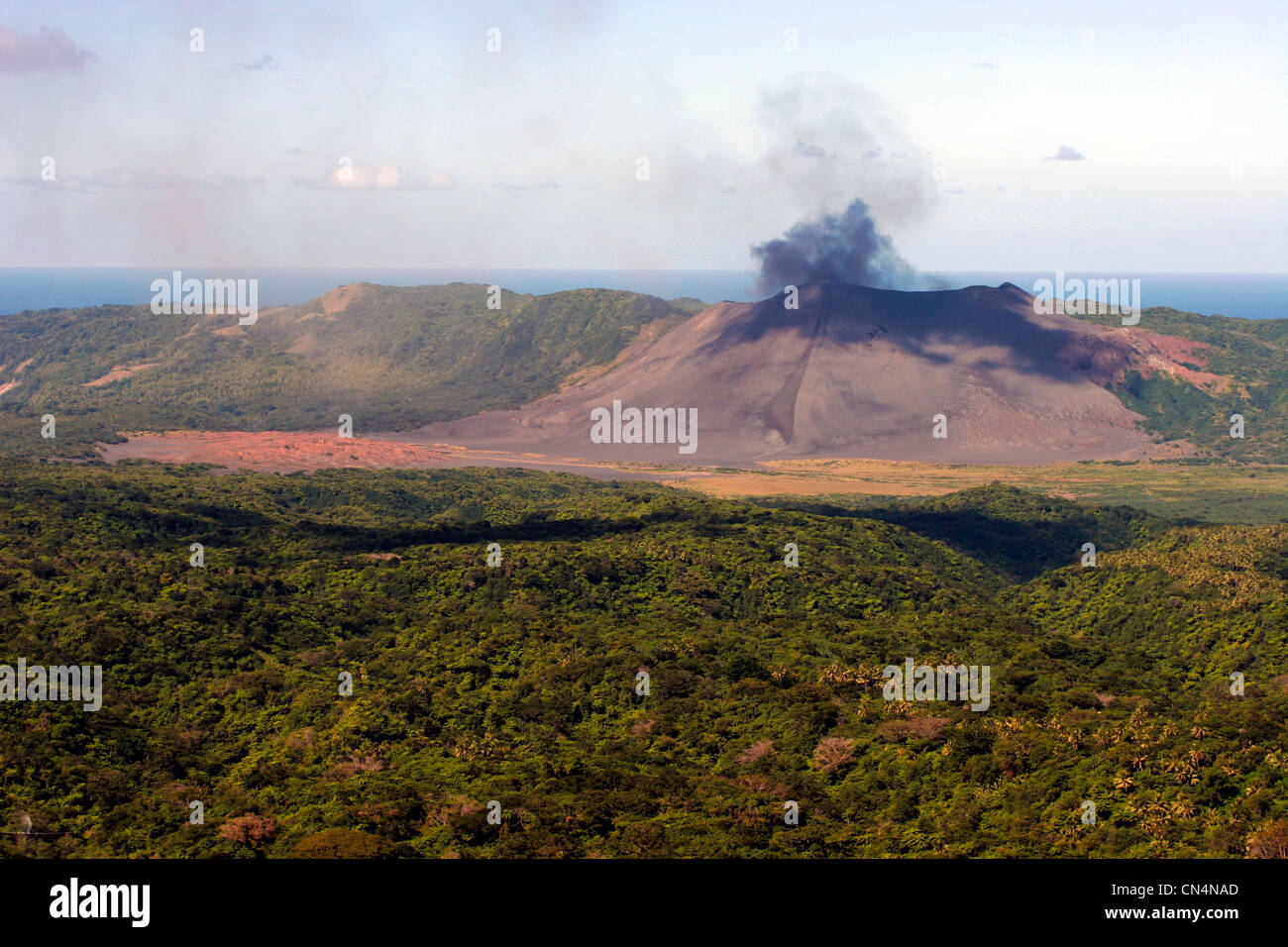 Vanuatu, Tafea Province, Tanna Island, Mount Yasur, volcanic eruption of Mount Yasur, overview with fumaroles and jungle in the Stock Photo