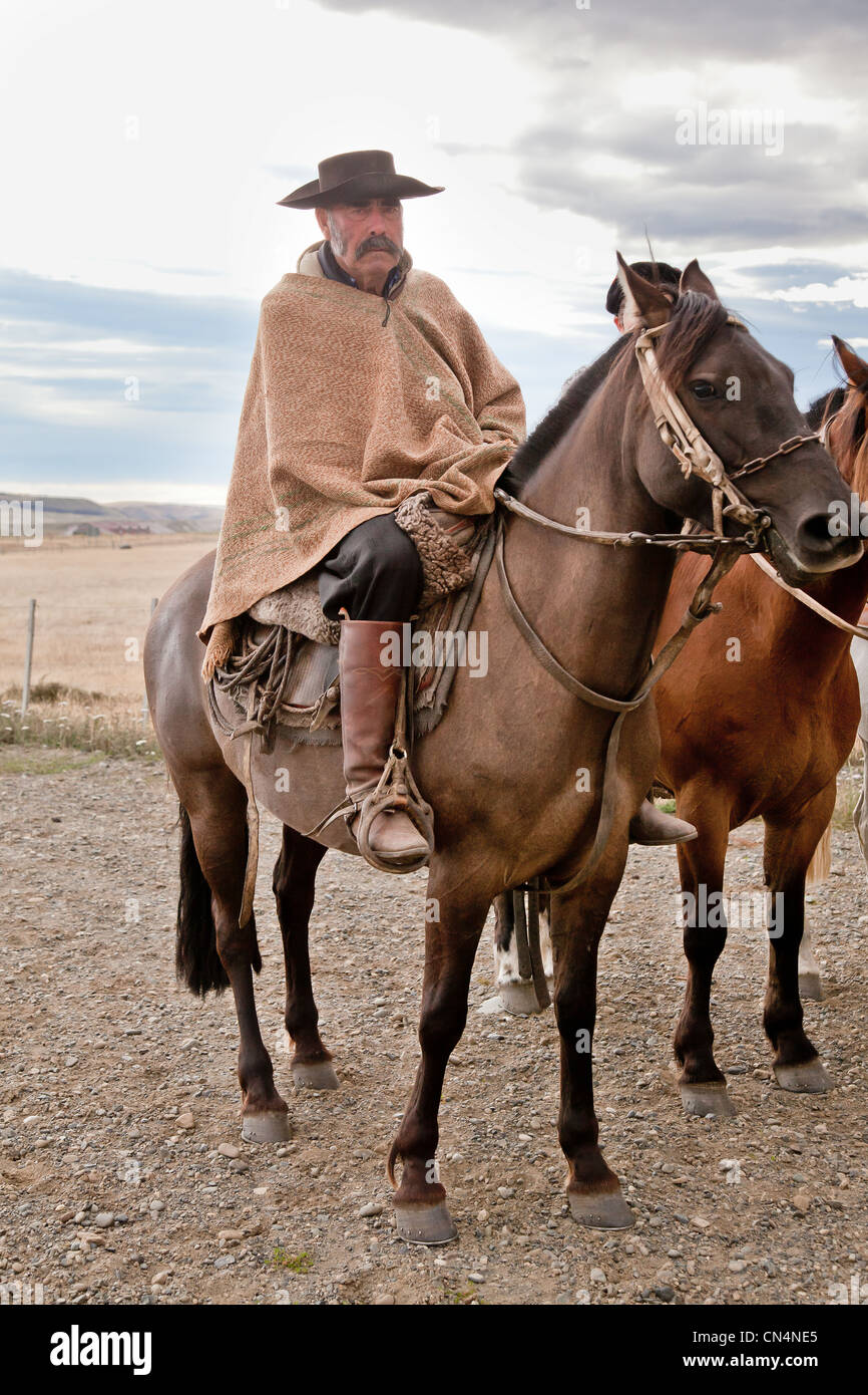 Argentina, Patagonia, Gauchos on horseback Stock Photo