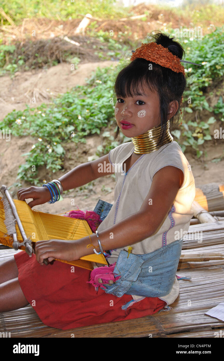 A young Kayan Lahwi girl at Karen Long Neck hill tribe village, Chiang Rai Province, Thailand Stock Photo