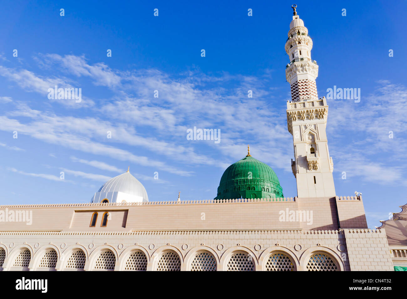 Nabawi Mosque minaret and dome in Medina, Saudi Arabia. The mosque is the second holiest mosque in Islam. Stock Photo