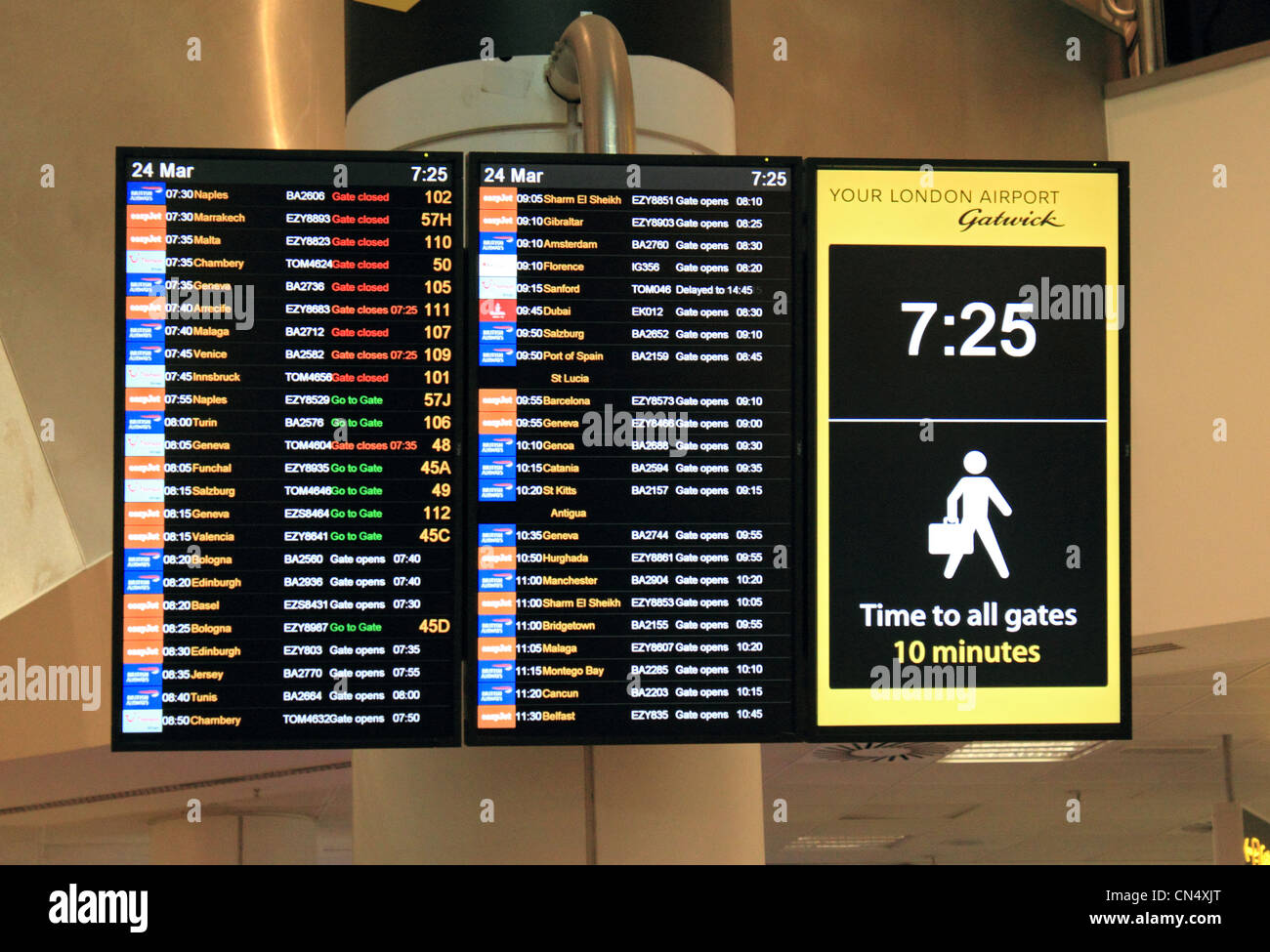 Departure board at Gatwick Airport North Terminal, Sussex England UK