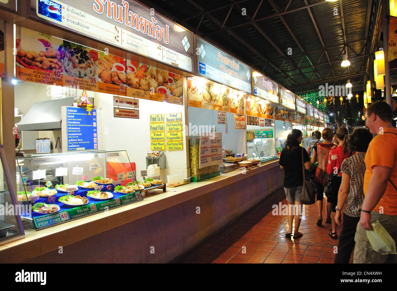 Anusarn Market food stalls in Chiang Mai Night Bazaar, Chan Klan Road, Chiang Mai, Chiang Mai Province, Thailand Stock Photo