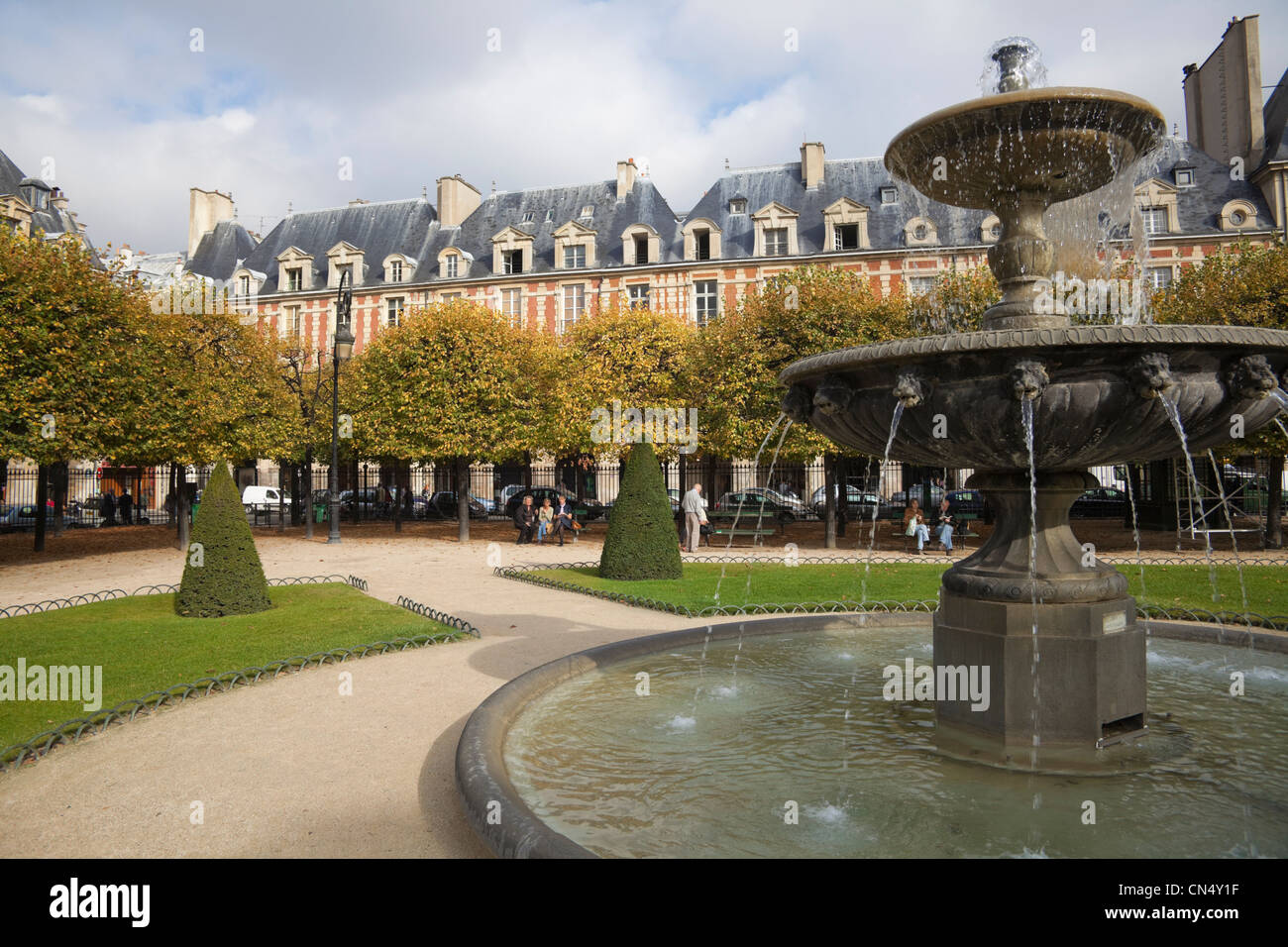 Fountain in Place de Louis XIII garden, Paris, France Stock Photo