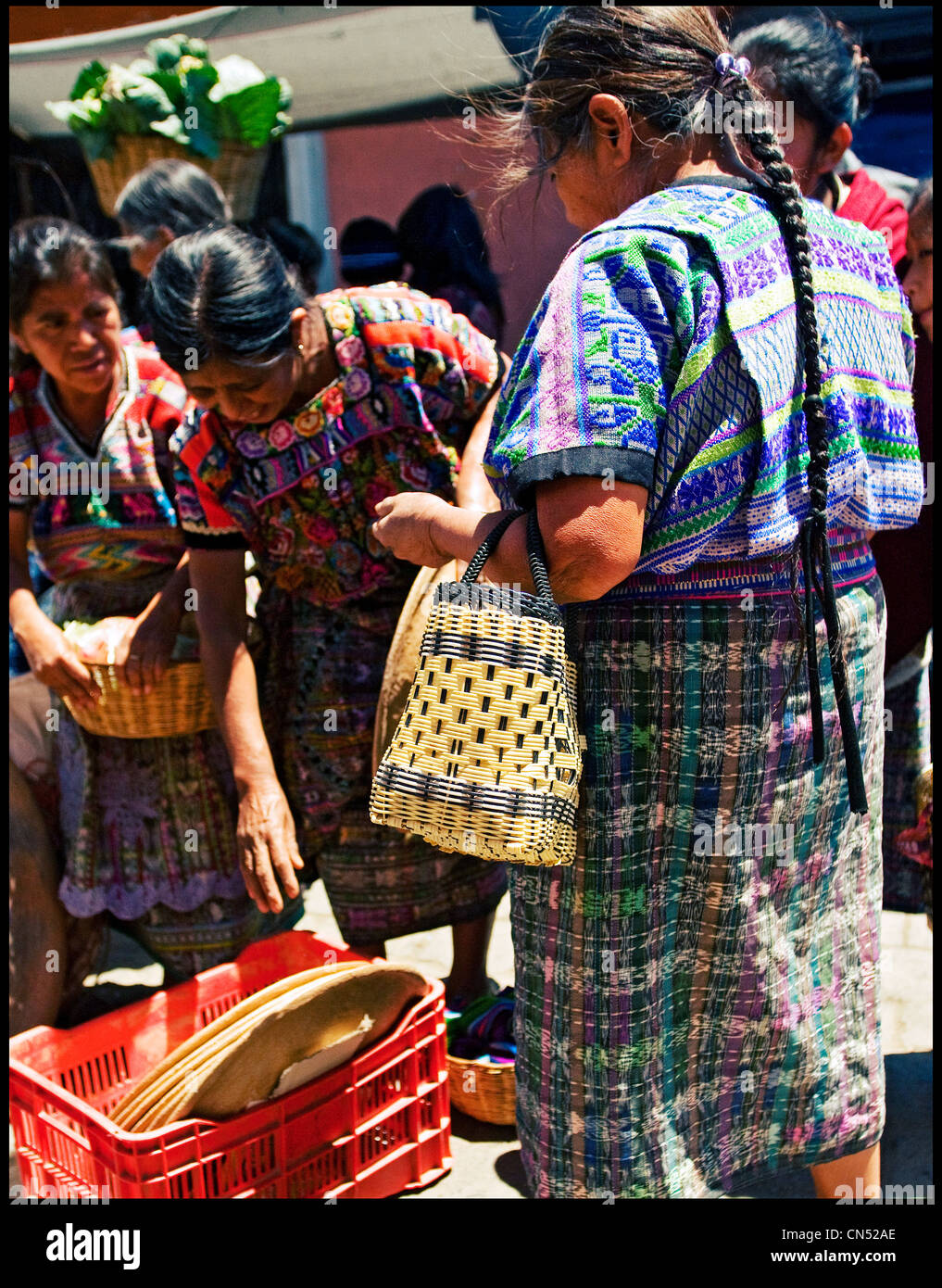 Mayan women shop for home items at the market in Comalapa. Stock Photo