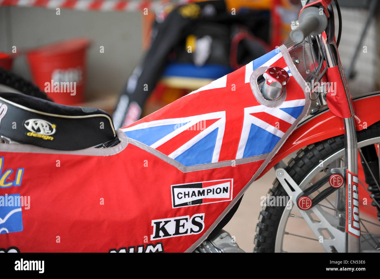 Patriotic Union Jack flag cover over the fuel tank of a speedway sports bike in the pits Stock