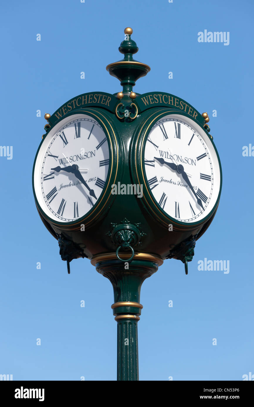 A 4-faced pedestal clock, dedicated to the Veterans of Westchester County, in White Plains, New York. Stock Photo