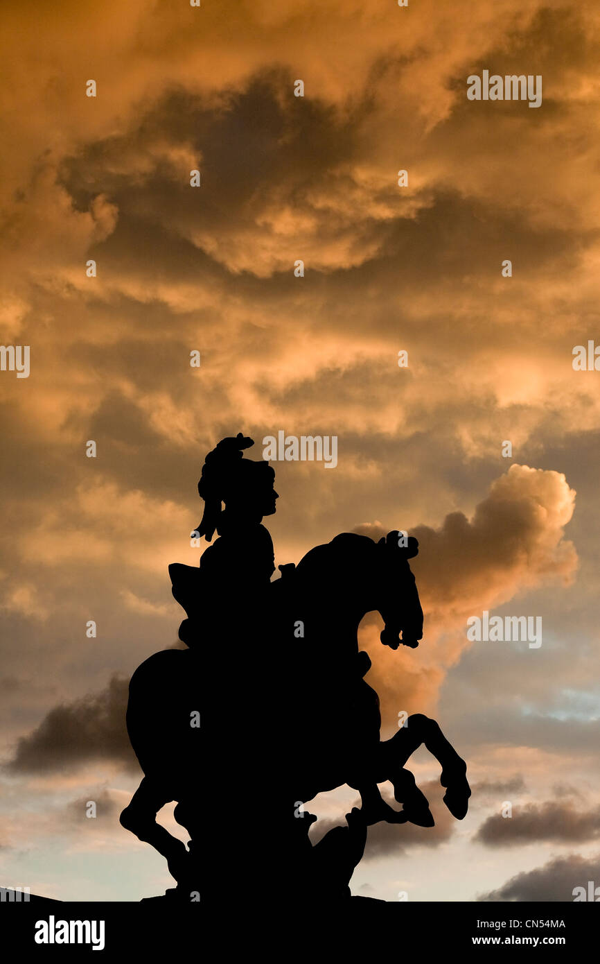 France, Paris, the Equestrian statue of Louis XIV in the Cour Napoleon of the Louvre Museum Stock Photo