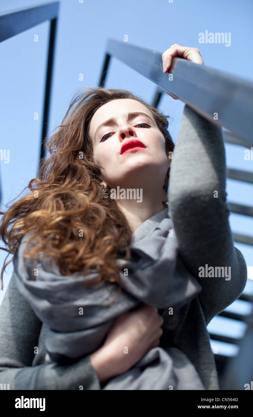 Headshot portrait of a beautiful young woman looking down, London, England, UK. Stock Photo