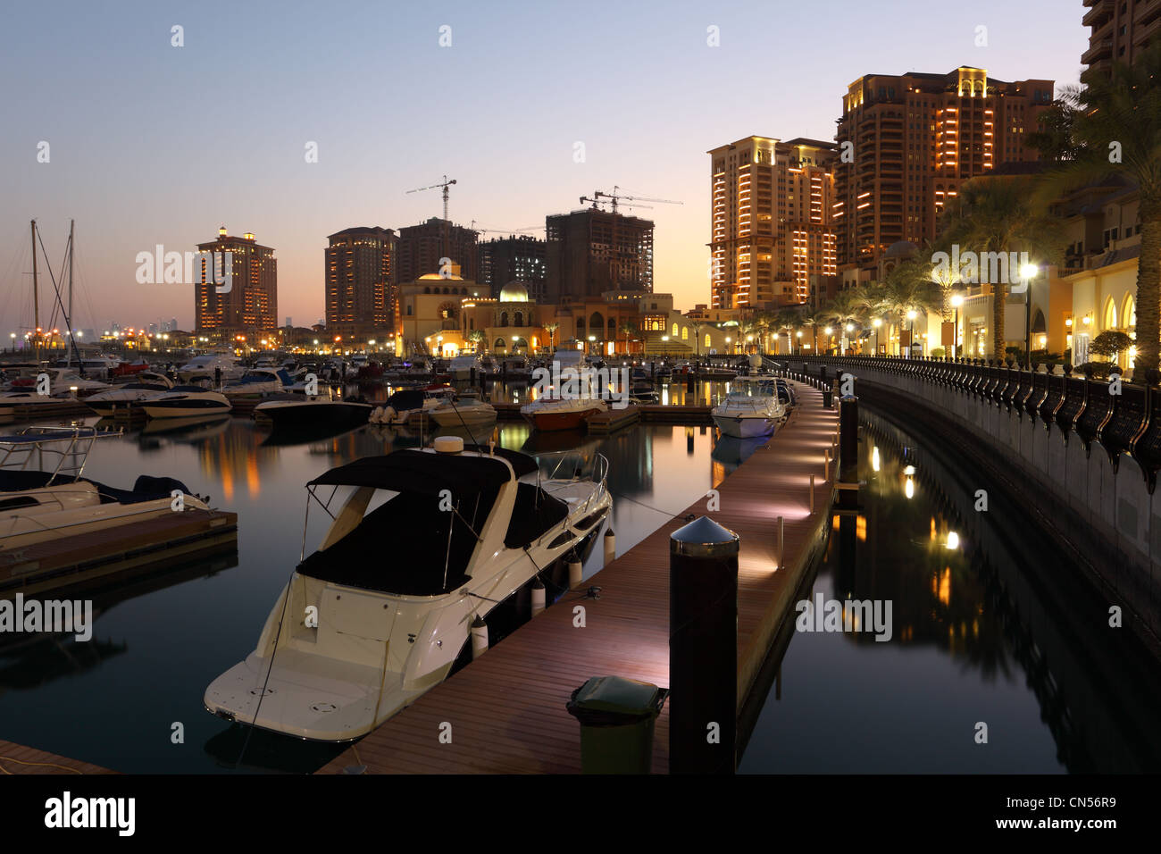 Porto Arabia at dusk. The Pearl in Doha, Qatar Stock Photo