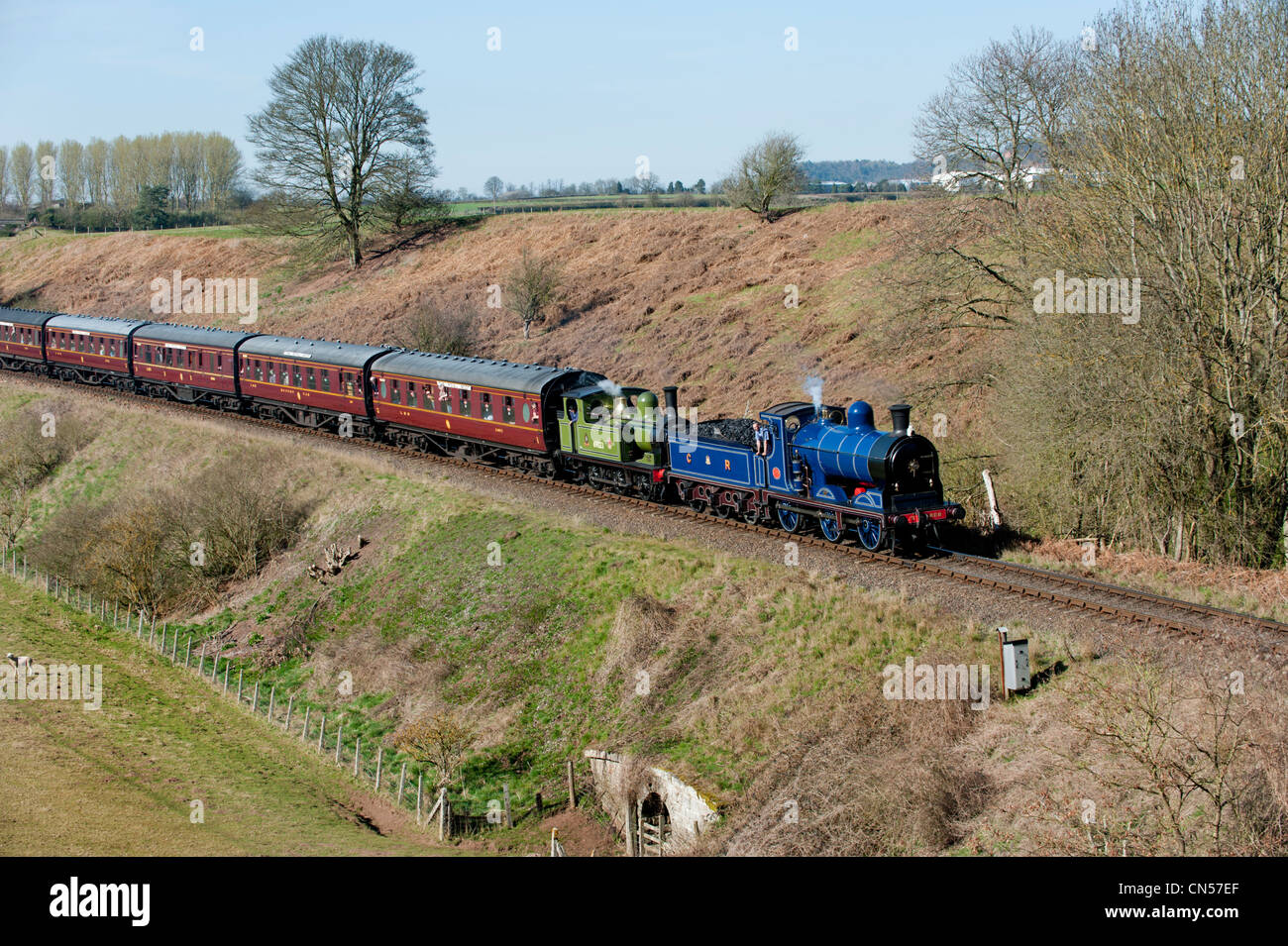A double-headed train, led by Caledonian Railway Company Locomotive No.828 on the  Severn Valley Railway at Eardington near Bridgnorth, Shropshire, UK Stock Photo