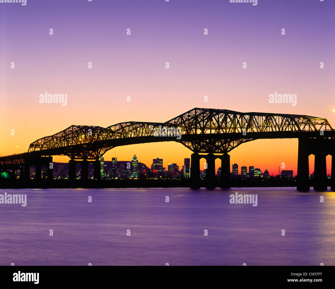 St.Lawrence River, Champlain Bridge and Downtown at Twilight, Montreal, Quebec Stock Photo