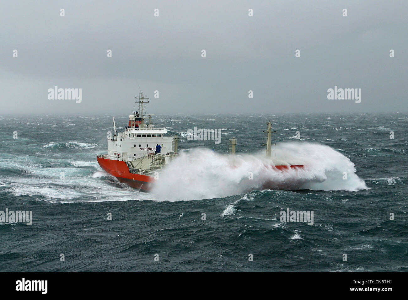 France, Morbihan, cargo in heavy weather off the coast of Belle Ile (aerial view) Stock Photo