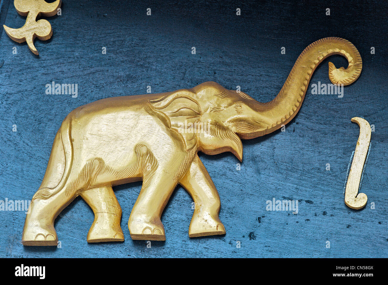 Laos, Luang Prabang Province, Luang Prabang City, listed as World Heritage by UNESCO, golden elephant sculpture Stock Photo