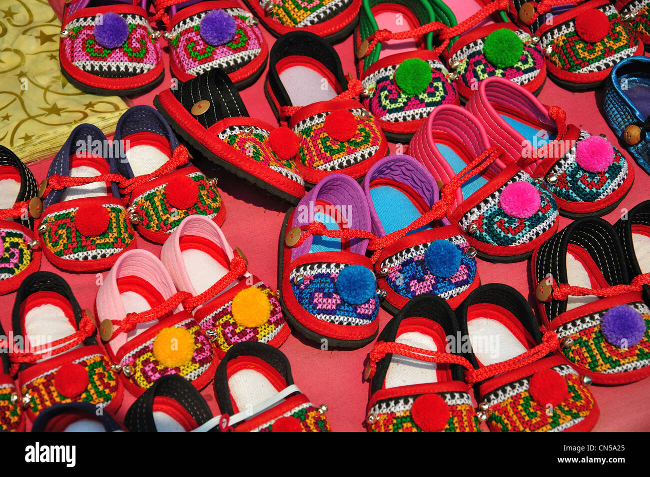 Children's slippers for sale at Hill tribes Village Museum and gardens, near Chiang Mai, Chiang Mai Province, Thailand Stock Photo