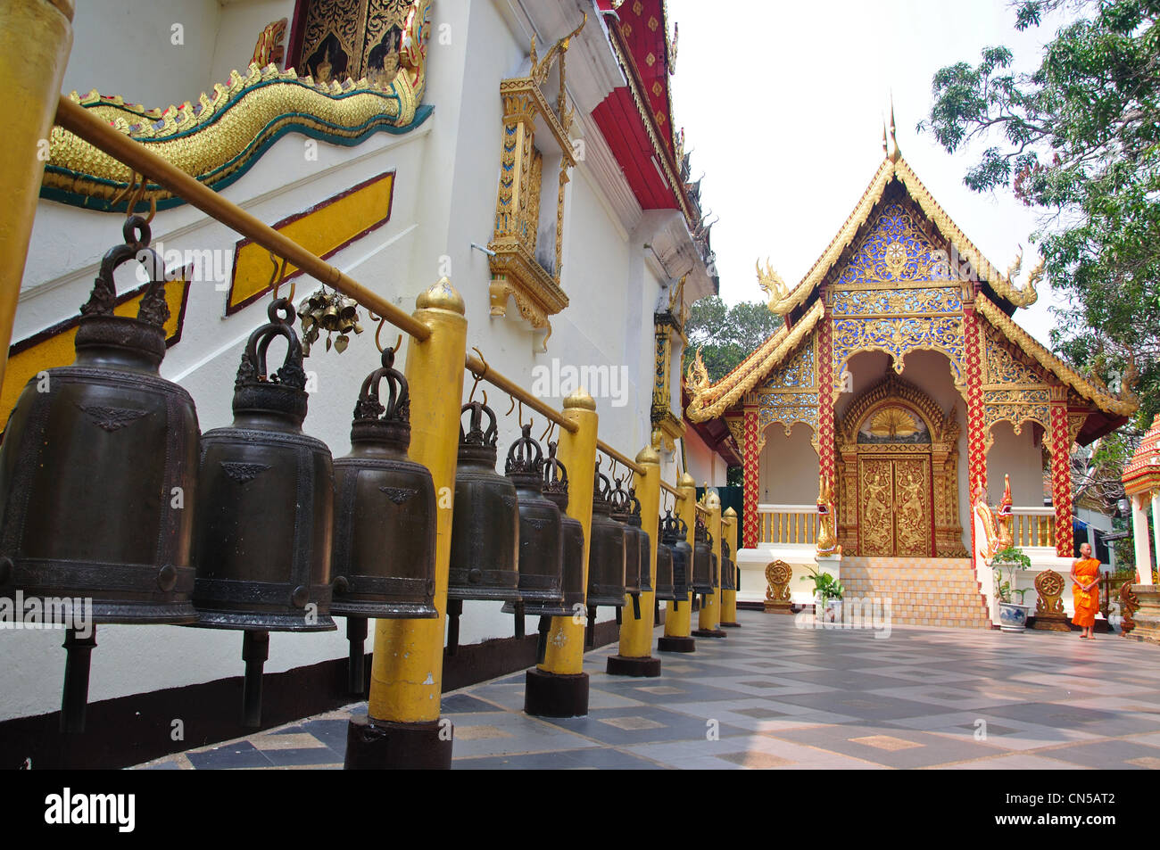 Line of copper gongs at Wat Phrathat Doi Suthep Buddhist temple, Doi Suthep, Chiang Mai, Chiang Mai Province, Thailand Stock Photo