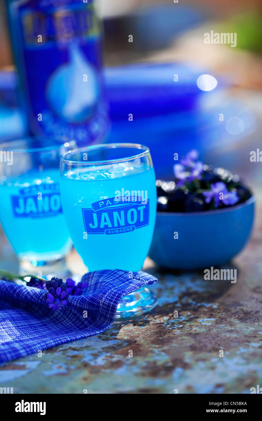 France, Bouches du Rhone, aperitif in Provence with the Pastis Bleu Janot (typical aniseed-flavoured alcohol, here colored in Stock Photo