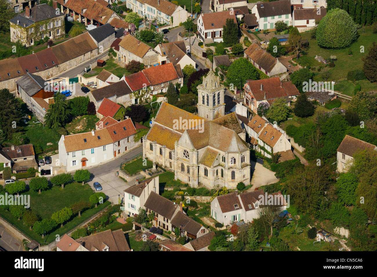 France, Val d'Oise, Epiais Rhus, the church Notre Dame de l'Assomption from the 16th century in the village (aerial view) Stock Photo