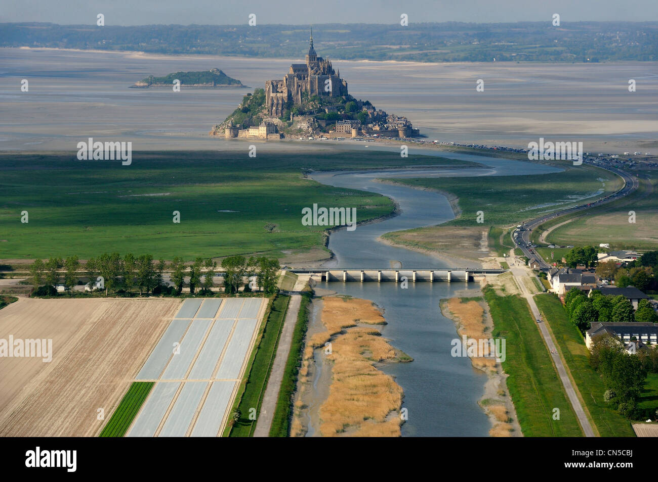 France, Manche, Mont St Michel, listed as World Heritage by UNESCO, dam on the Couesnon (aerial view) Stock Photo