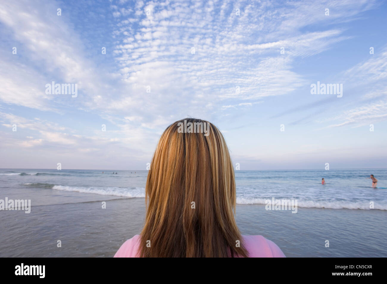 Teenager (15 years old) Looking at the Ocean Stock Photo