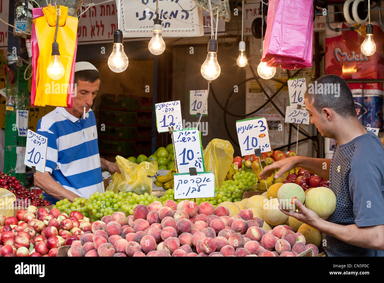 Israel, Tel Aviv, Carmel Market, greengrocer Stock Photo