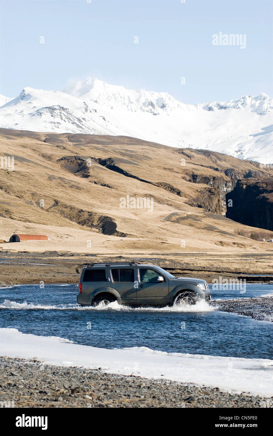 Iceland, Sudurland Region, four wheel drive crossing a river Stock Photo