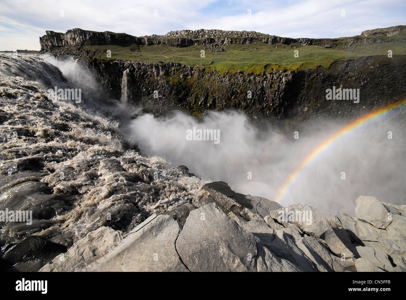Iceland, Nordurland Eystra Region, Jokulsargljufur National Park, rainbow over Dettifoss Waterfall and Jokulssa a Fjollum River Stock Photo