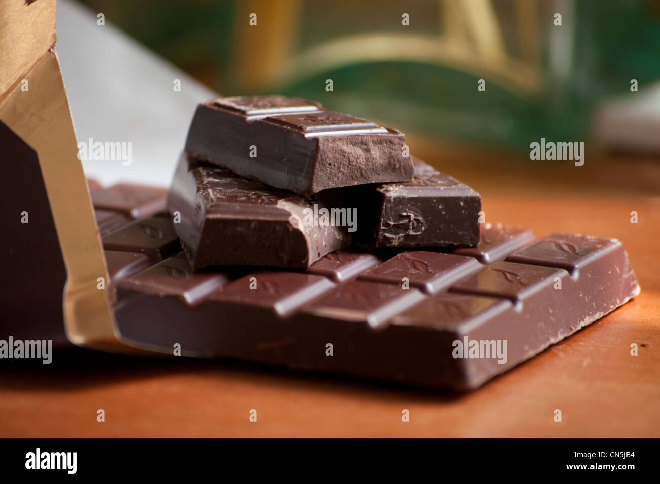 Dark chocolate bar in wrapper. Stock Photo