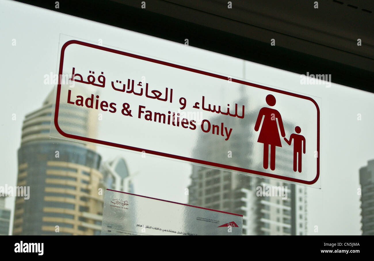 Bus sign 'ladies and families only' seating, Dubai, United Arab Emirates Stock Photo