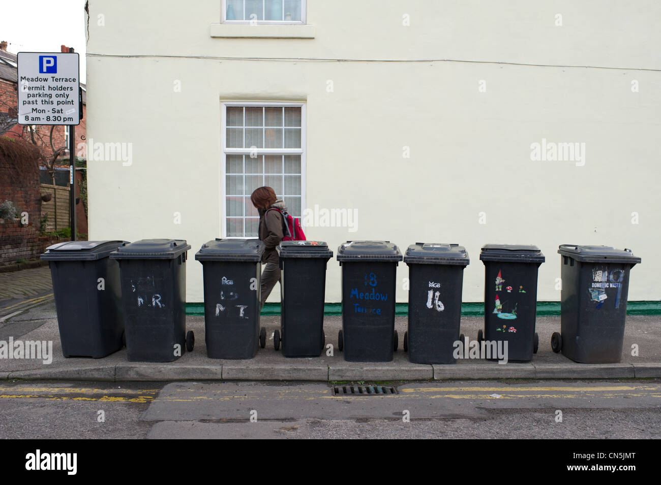 Wheelie bins on the pavement waiting to be emptied Stock Photo Alamy