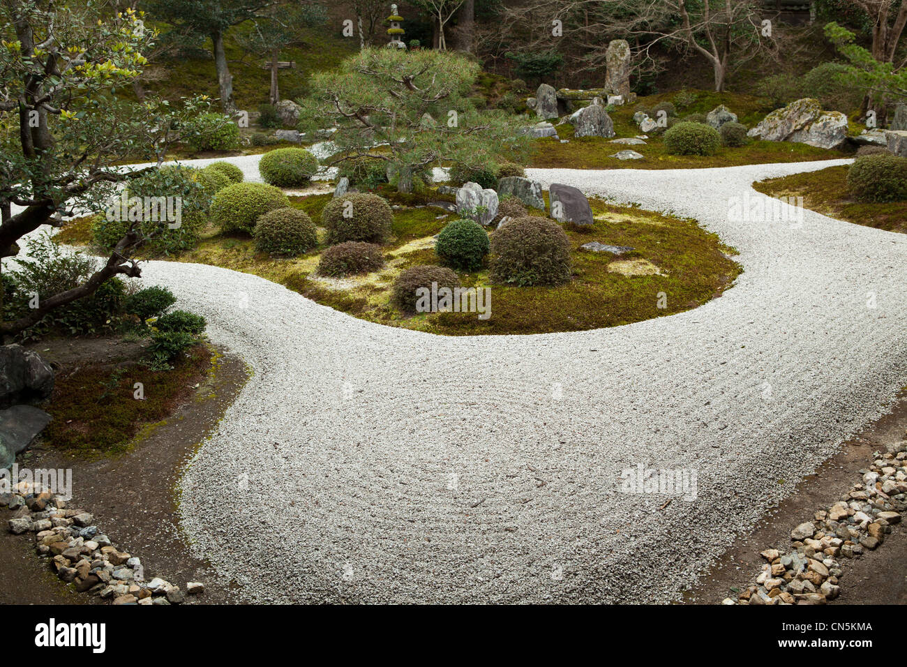 Manshu-in is a Karesansui zen garden containing a Pinus pentaphylla tree, now about 400 years old, set within an 'island'. Stock Photo