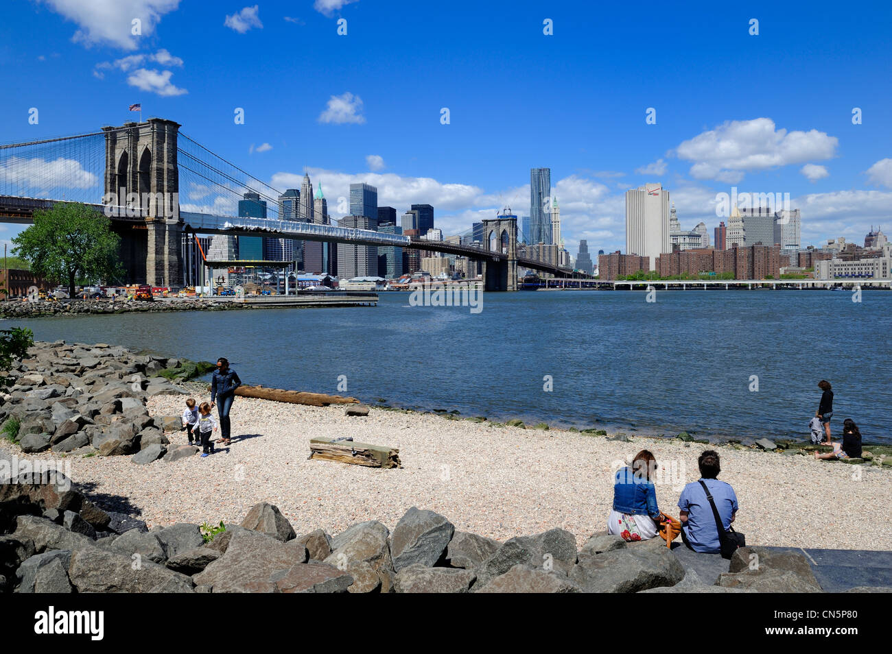 United States, New York City, Brooklyn Bridge from Brooklyn Bridge Park and the Beekman Tower from the architect Frank Gehry Stock Photo