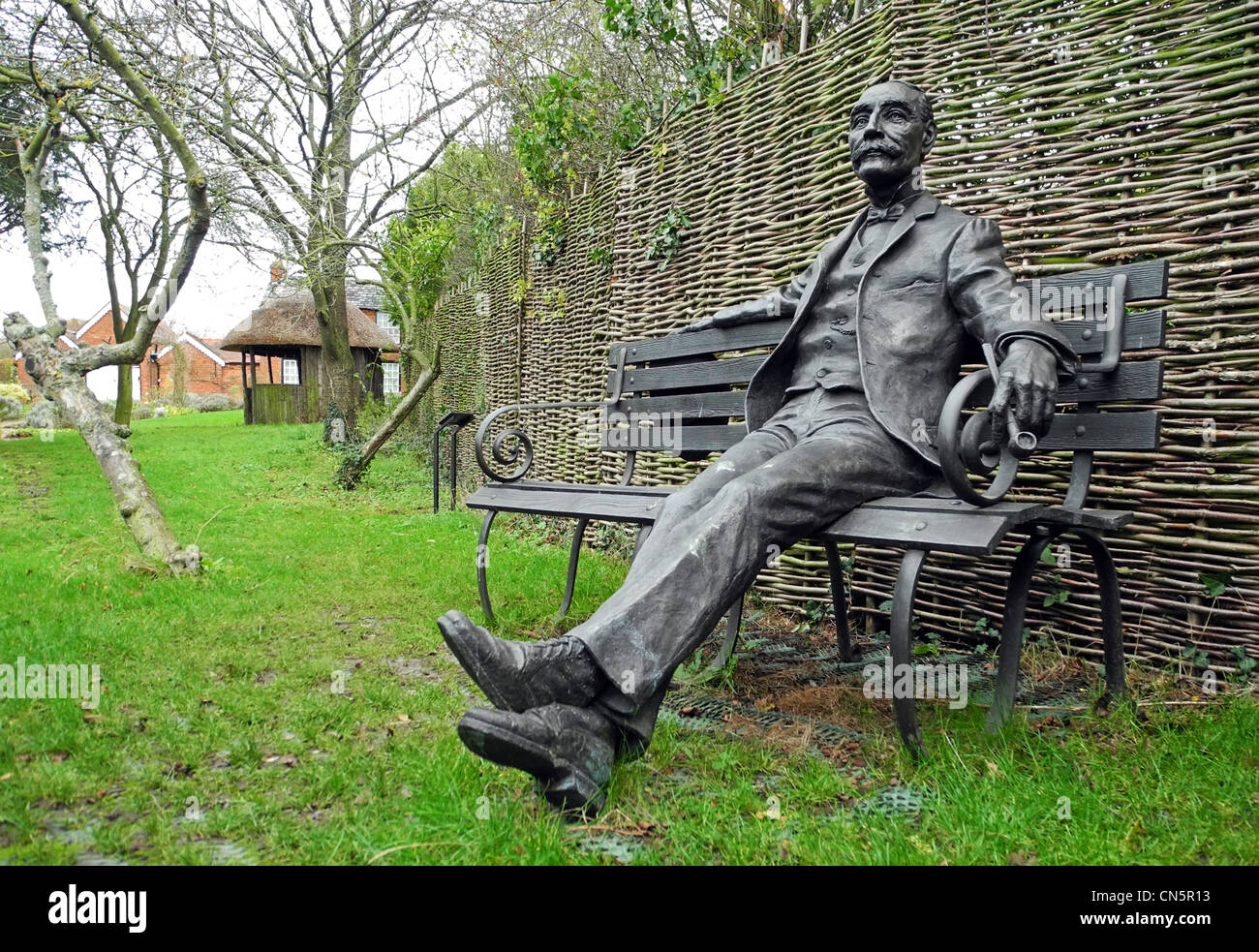 Statue of Edward Elgar in the garden the birthplace of composer Sir Edward Elgar Firs cottage in Lower Broadheath Worcestershire Stock Photo