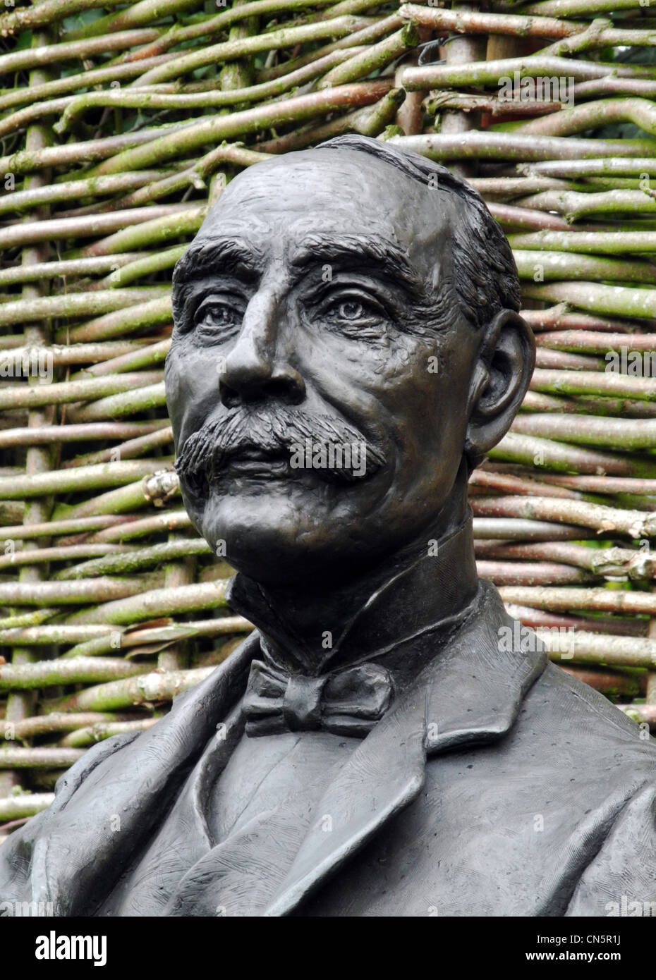 Statue of Edward Elgar in the garden the birthplace of composer Sir Edward Elgar Firs cottage in Lower Broadheath Worcestershire Stock Photo
