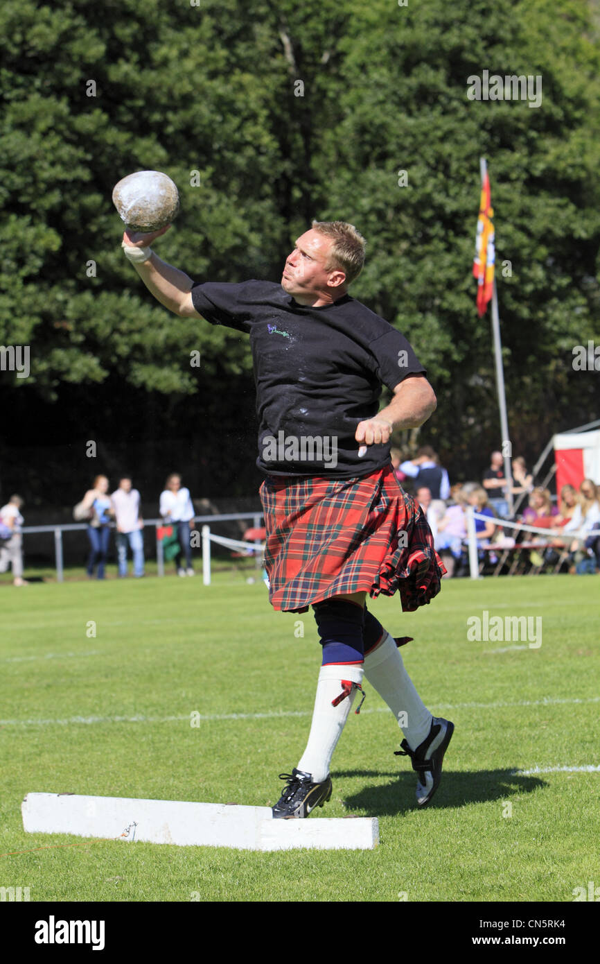 United Kingdom, Scotland, Strathclyde region, Argyll county, Oban, Scottish games, heavy stone put Stock Photo