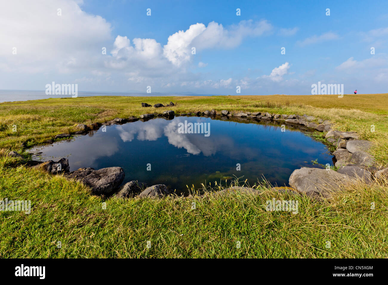South Korea, Jeju Province, reflection of the sky in a small pond Stock Photo