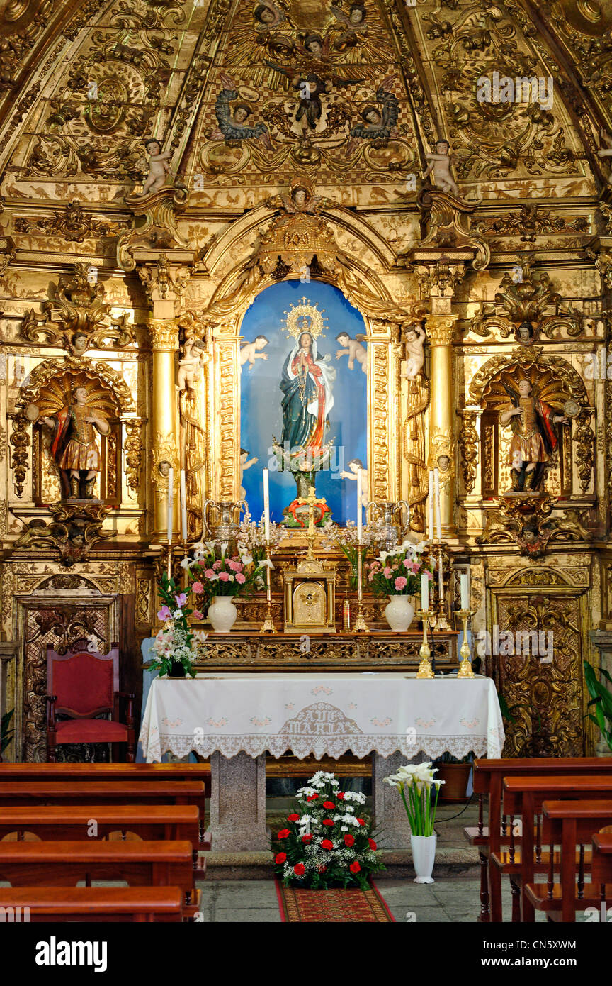 Spain, Extremadura, Jarandilla de la Vera, hermitage of Nuestra Senora del Sopetran, rococo altarpiece installed on a stone Stock Photo