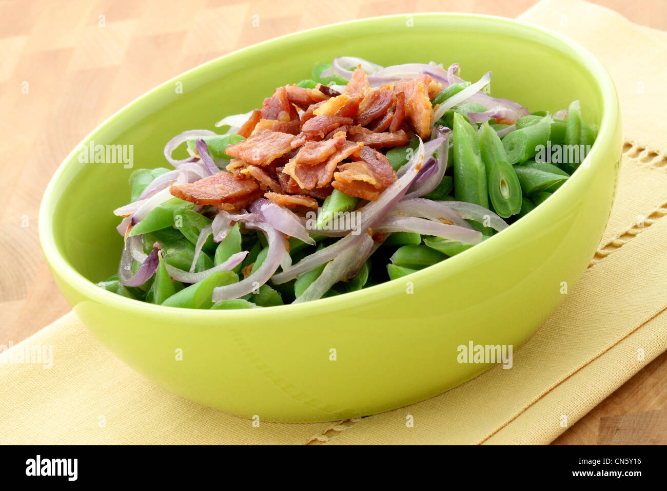 A holiday green bean casserole recipe, made with green beans, bacon or pancetta and sauteed