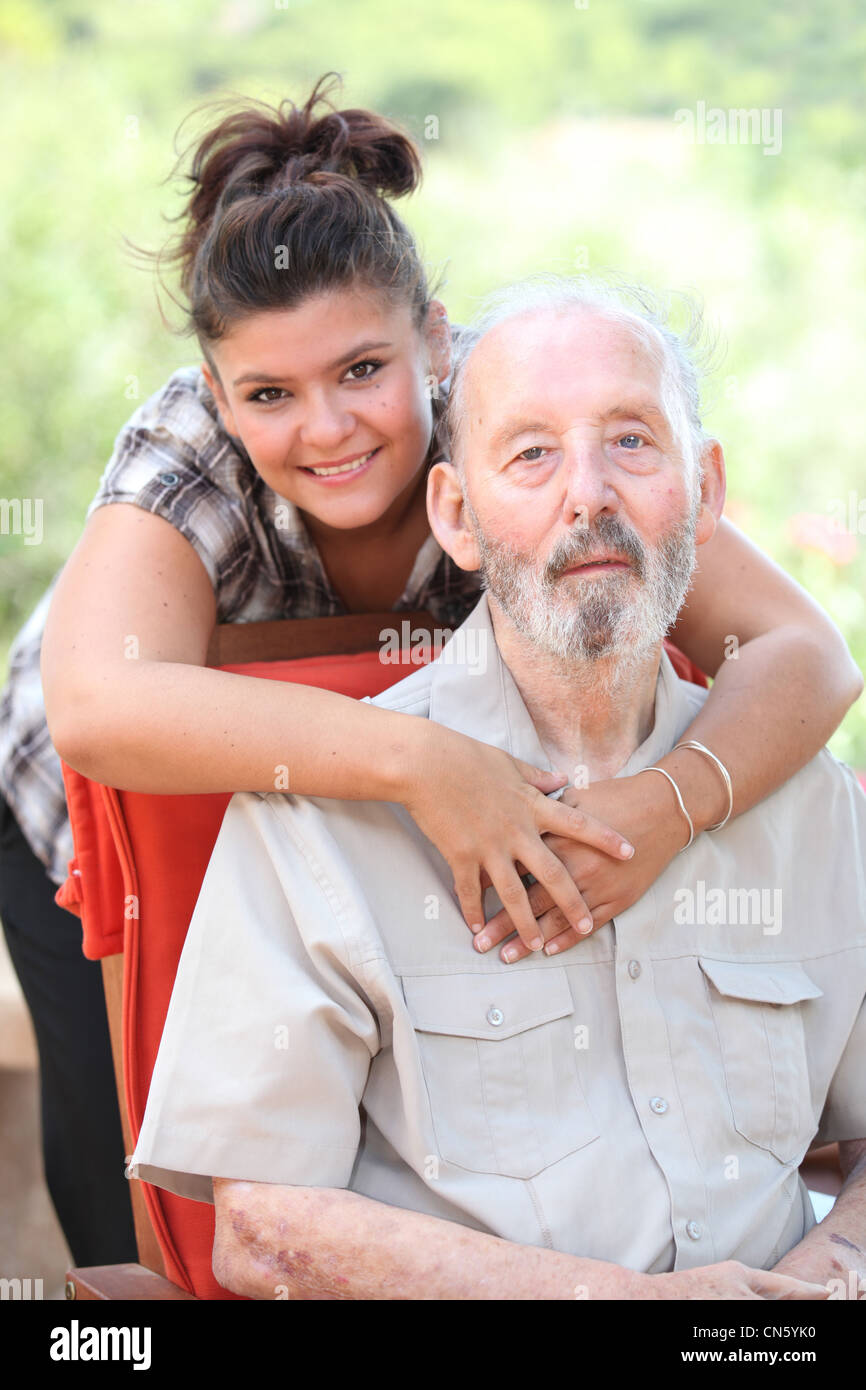 Grandad or grandpa with smiling happy loving grandaughter Stock Photo