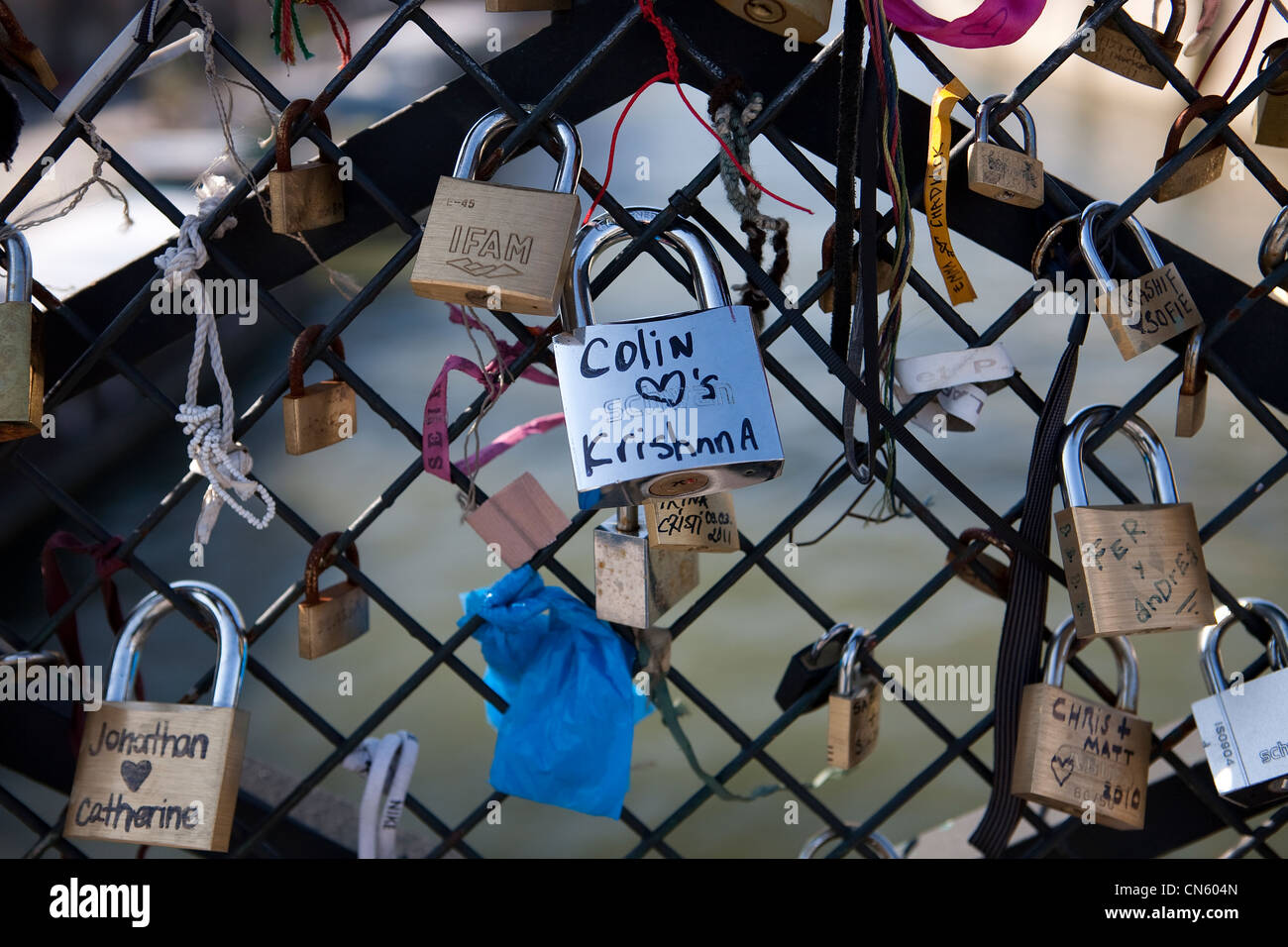 France, Paris, Archeveche bridge, padlocks hung by lovers on the railing Stock Photo